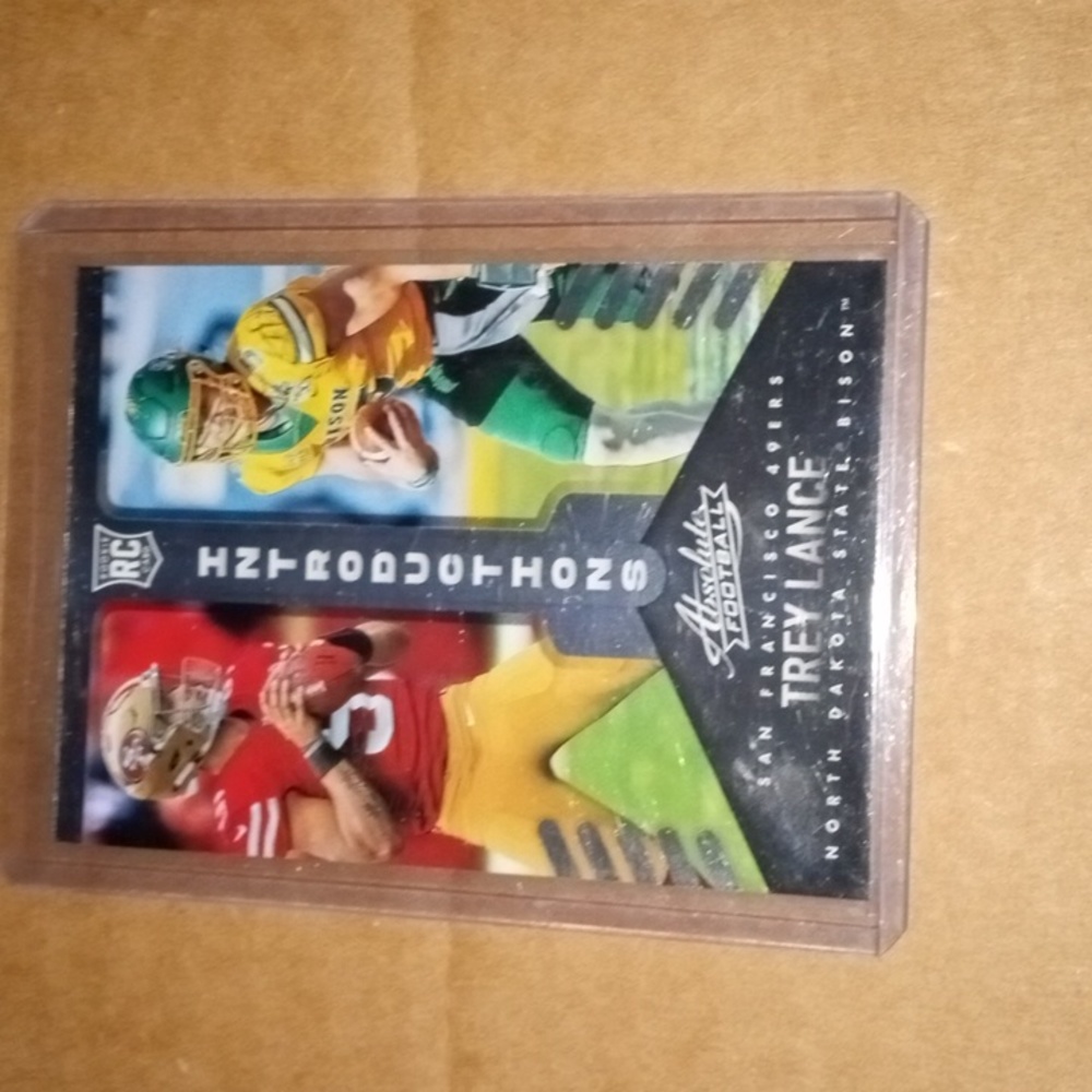 Trey Lance rookie NFL and college uniform)Cowboys